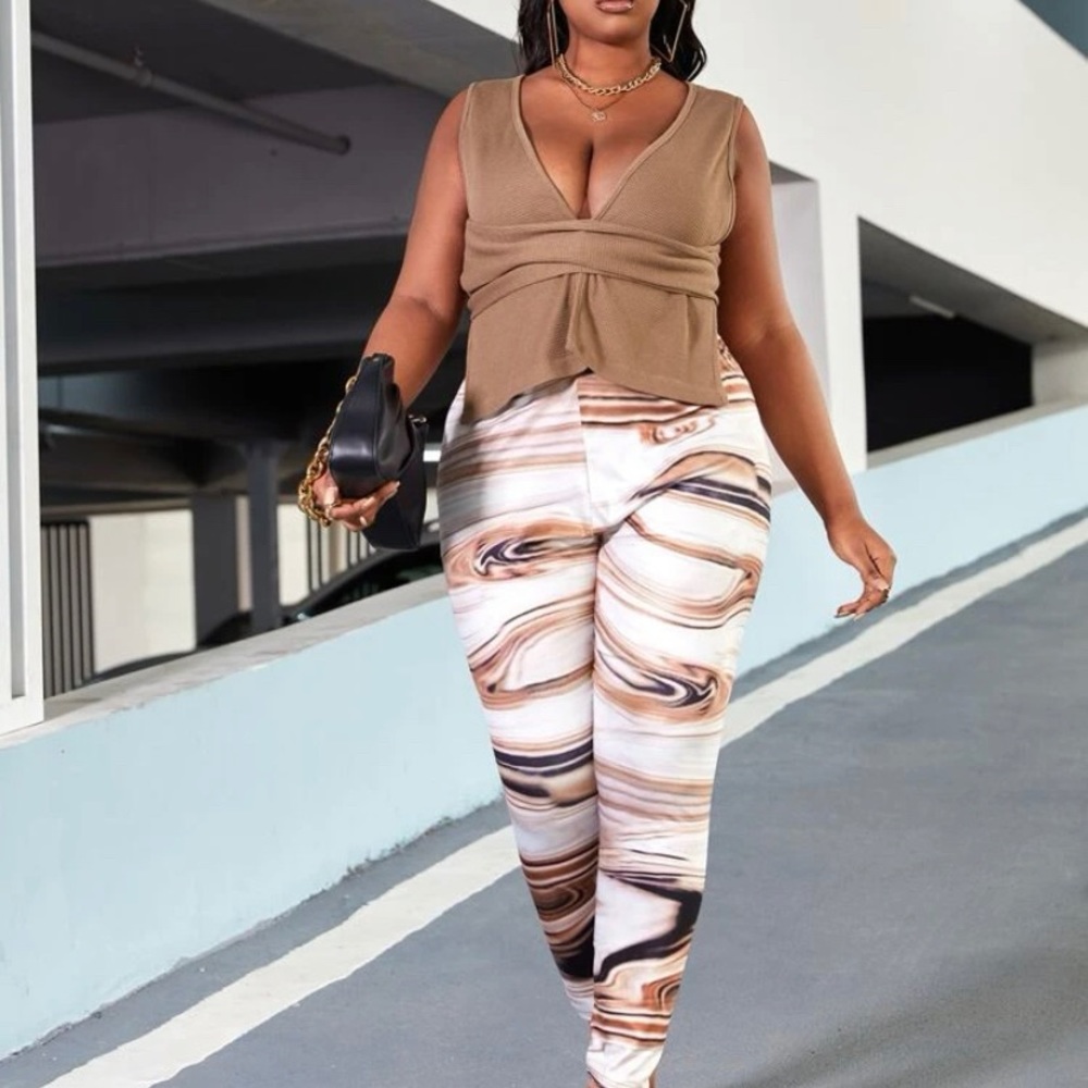 Brand New Never Worn Plunging neck tie back tank top and marble print leggings